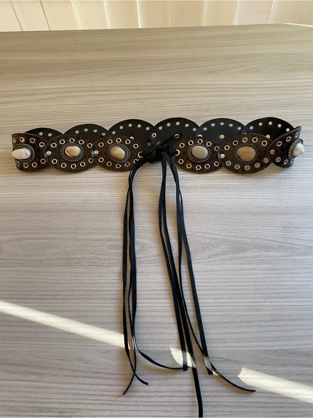 Vintage Western-Inspired brown Leather Lace-Up Belt with Concho Accents antique